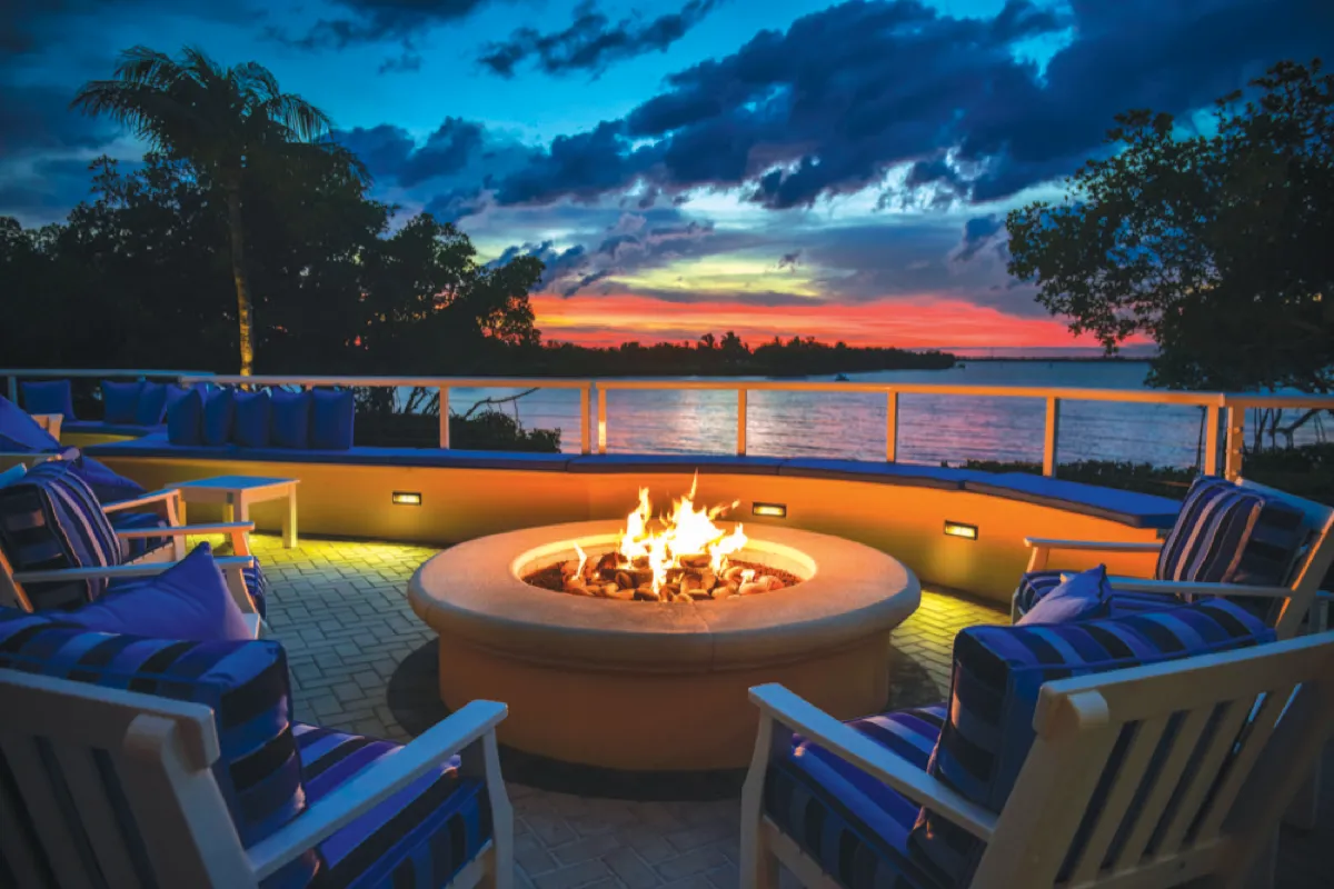 Sunset firepit overlooking the Indian River at The Moorings Yacht & Country Club