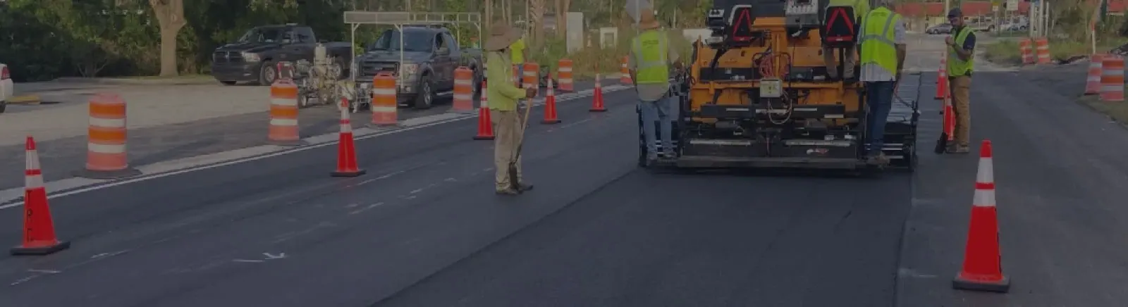 TRC crew running an asphalt paver on a Treasure Coast roadway